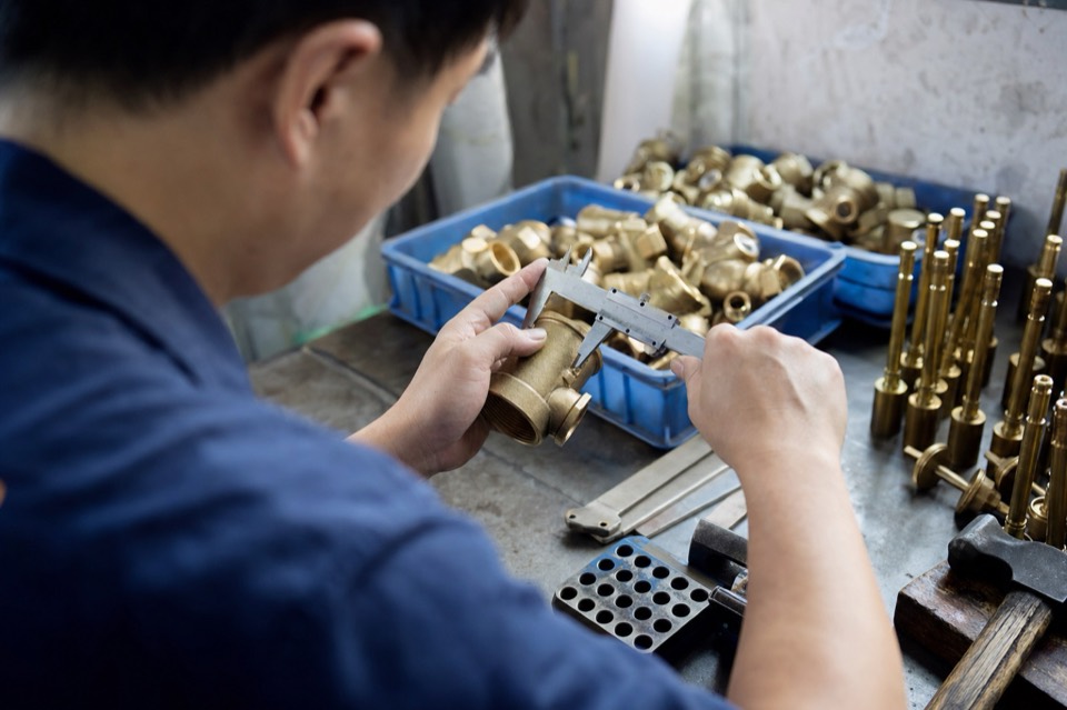 Dimensional inspection of a machined brass valve body